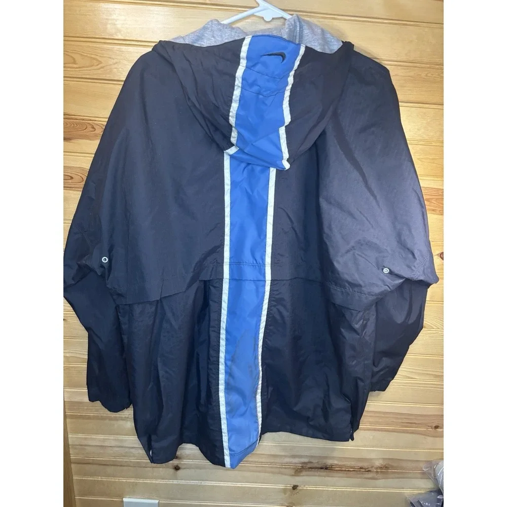 VINTAGE Nike Rain Jacket Boys 12-14 Large Blue Spellout Center Swoosh Pullover